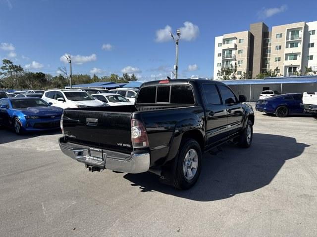 2014 Black Toyota Tacoma (5TFLU4EN0EX) with an 6 4.0 L engine, Automatic transmission, located at 27610 S Dixie Hwy, Homestead, FL, 33032, (305) 749-2348, 25.510241, -80.438301 - KBB.com Best Resale Value Awards. Only 56,851 Miles! Boasts 21 Highway MPG and 16 City MPG! This Toyota Tacoma boasts a Regular Unleaded V-6 4.0 L/241 engine powering this Automatic transmission. Wheels: 16 x 7J+30 Style Steel, Urethane Gear Shifter Material, Transmission: 5-Speed Automatic w/ECT-i. - Photo#4