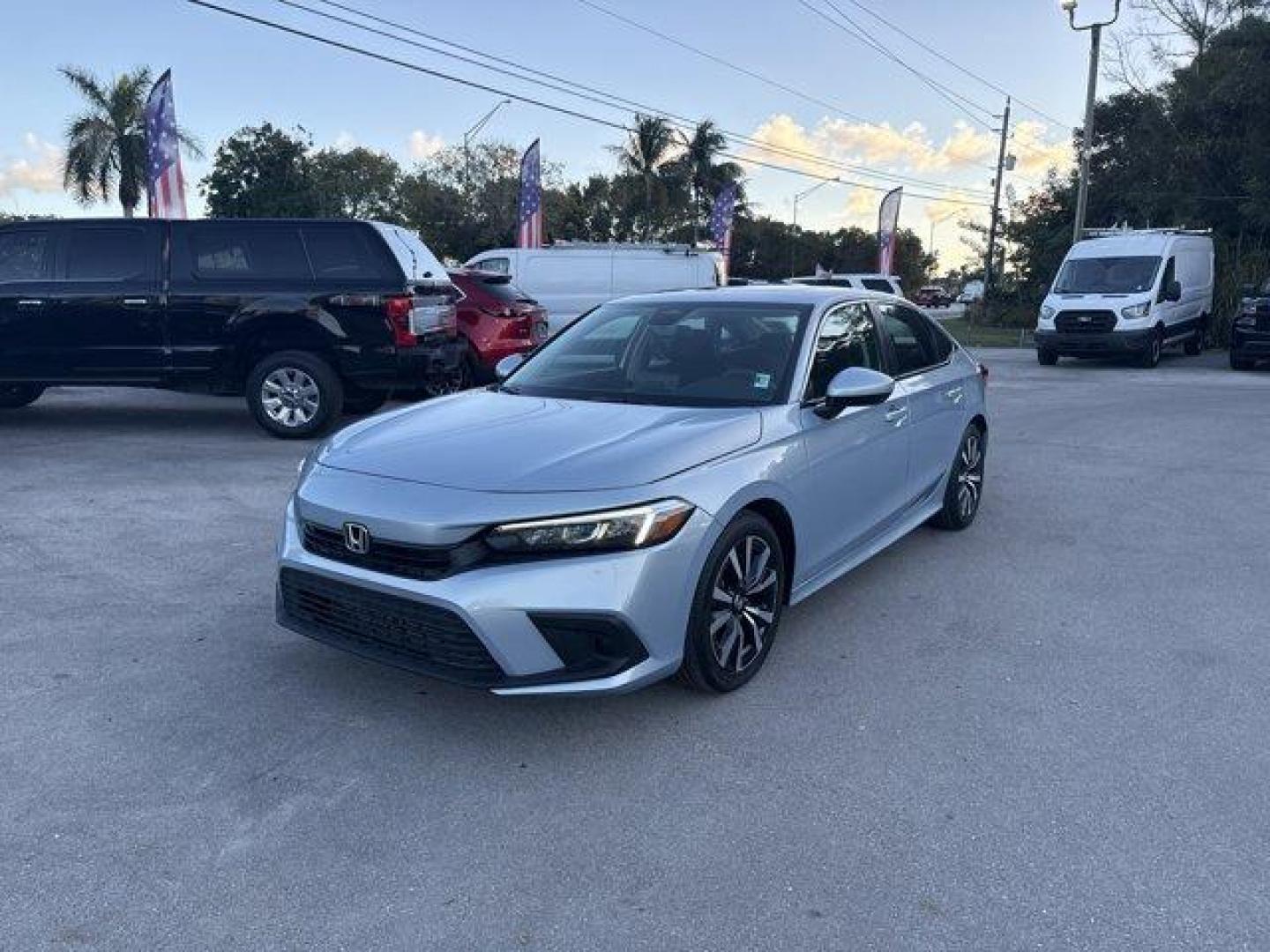 2022 Silver Honda Civic Sedan (2HGFE1F74NH) with an 4 1.5 L engine, Variable transmission, located at 27610 S Dixie Hwy, Homestead, FL, 33032, (305) 749-2348, 25.510241, -80.438301 - NACTOY 2022 North American Car of the Year. Only 15,061 Miles! Boasts 42 Highway MPG and 33 City MPG! This Honda Civic Sedan delivers a Intercooled Turbo Premium Unleaded I-4 1.5 L/91 engine powering this Variable transmission. Wireless Phone Connectivity, Vehicle Stability Assist (VSA) Electronic S - Photo#0