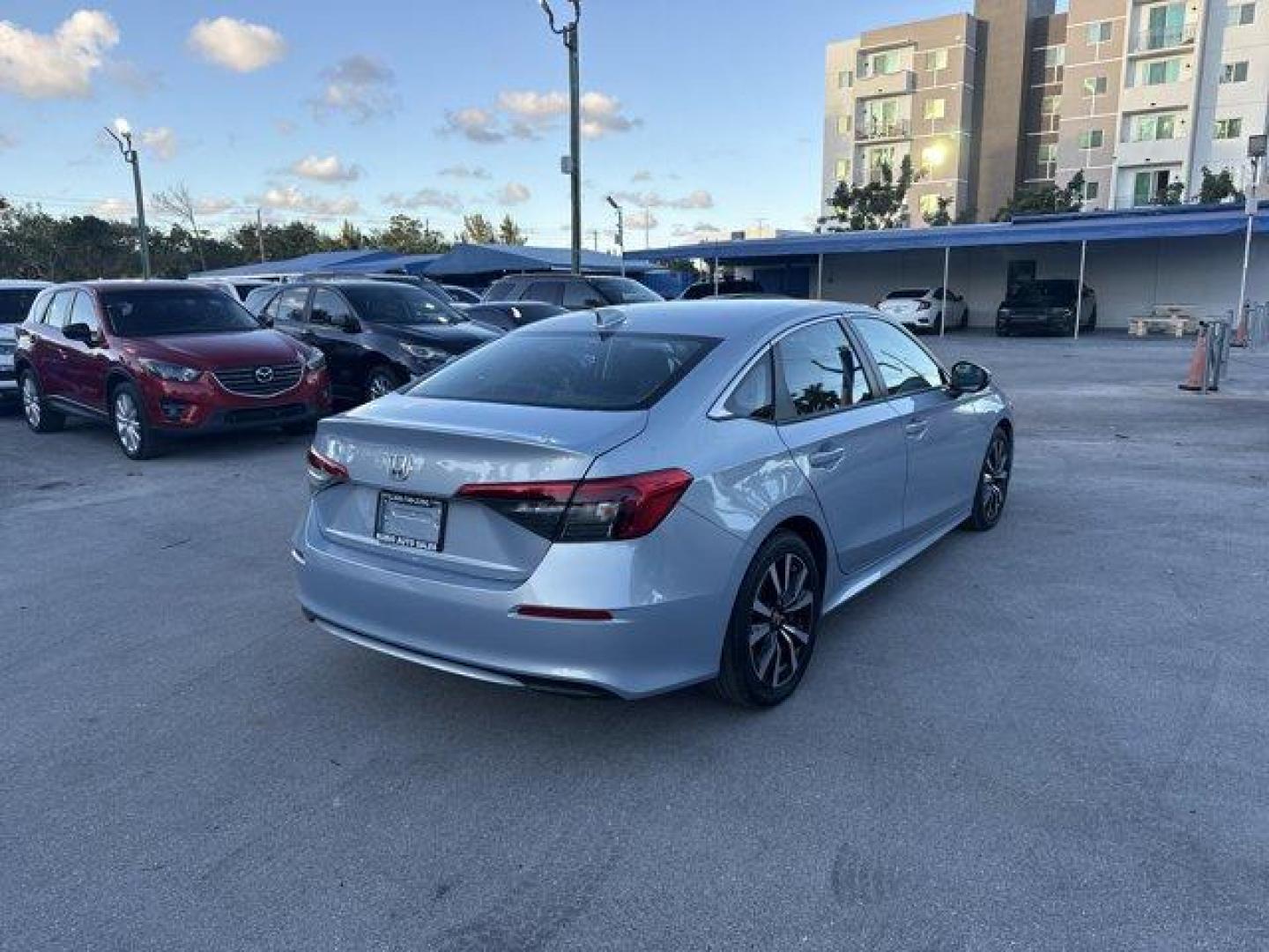 2022 Silver Honda Civic Sedan (2HGFE1F74NH) with an 4 1.5 L engine, Variable transmission, located at 27610 S Dixie Hwy, Homestead, FL, 33032, (305) 749-2348, 25.510241, -80.438301 - NACTOY 2022 North American Car of the Year. Only 15,061 Miles! Boasts 42 Highway MPG and 33 City MPG! This Honda Civic Sedan delivers a Intercooled Turbo Premium Unleaded I-4 1.5 L/91 engine powering this Variable transmission. Wireless Phone Connectivity, Vehicle Stability Assist (VSA) Electronic S - Photo#4