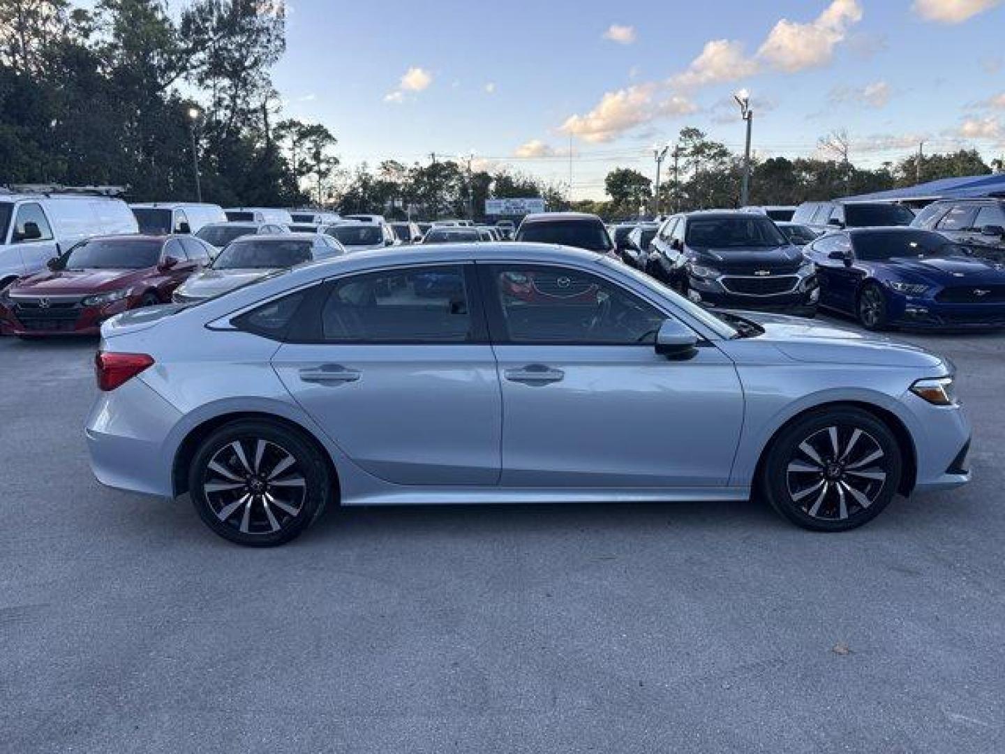 2022 Silver Honda Civic Sedan (2HGFE1F74NH) with an 4 1.5 L engine, Variable transmission, located at 27610 S Dixie Hwy, Homestead, FL, 33032, (305) 749-2348, 25.510241, -80.438301 - NACTOY 2022 North American Car of the Year. Only 15,061 Miles! Boasts 42 Highway MPG and 33 City MPG! This Honda Civic Sedan delivers a Intercooled Turbo Premium Unleaded I-4 1.5 L/91 engine powering this Variable transmission. Wireless Phone Connectivity, Vehicle Stability Assist (VSA) Electronic S - Photo#5
