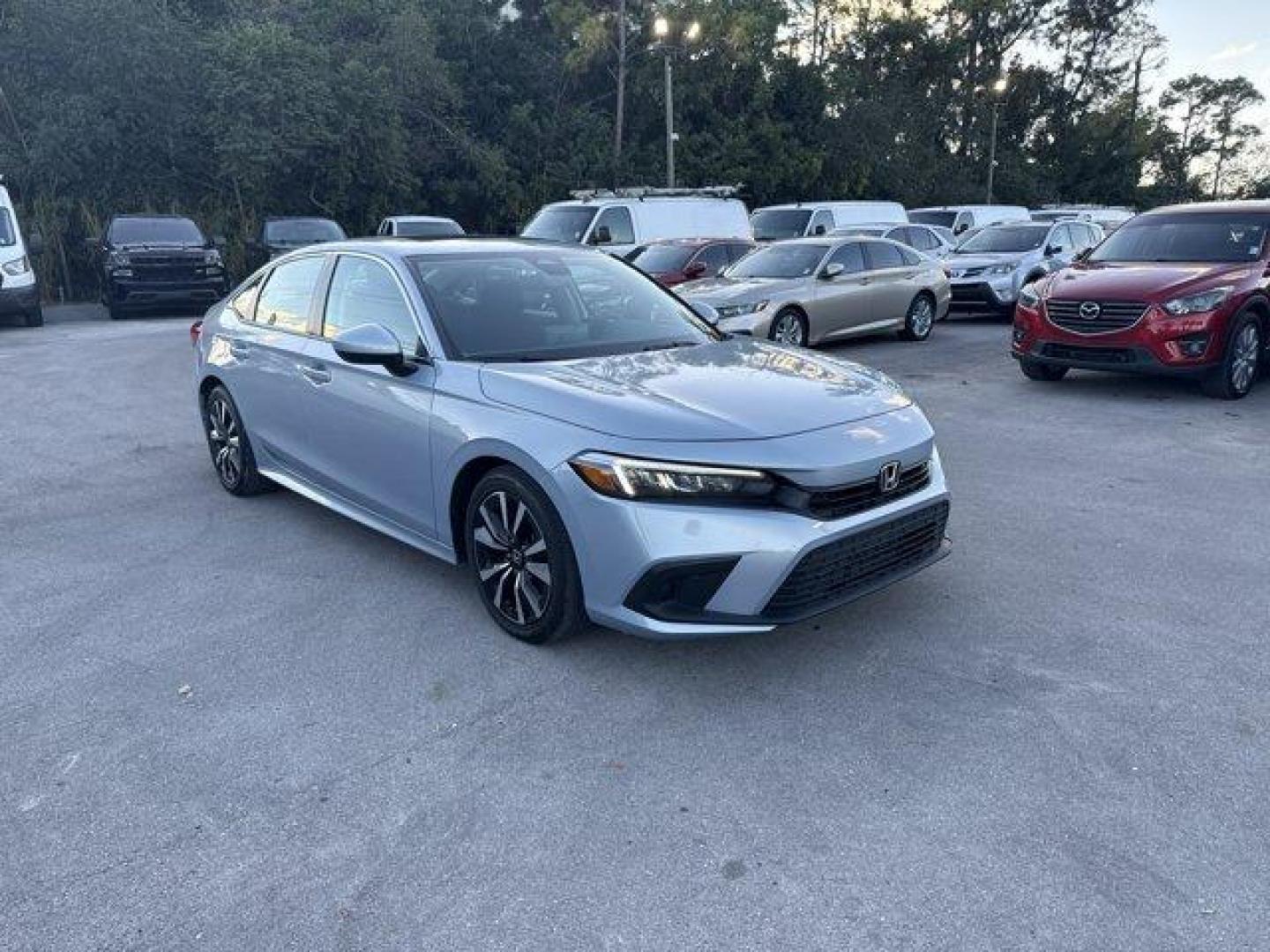 2022 Silver Honda Civic Sedan (2HGFE1F74NH) with an 4 1.5 L engine, Variable transmission, located at 27610 S Dixie Hwy, Homestead, FL, 33032, (305) 749-2348, 25.510241, -80.438301 - NACTOY 2022 North American Car of the Year. Only 15,061 Miles! Boasts 42 Highway MPG and 33 City MPG! This Honda Civic Sedan delivers a Intercooled Turbo Premium Unleaded I-4 1.5 L/91 engine powering this Variable transmission. Wireless Phone Connectivity, Vehicle Stability Assist (VSA) Electronic S - Photo#6