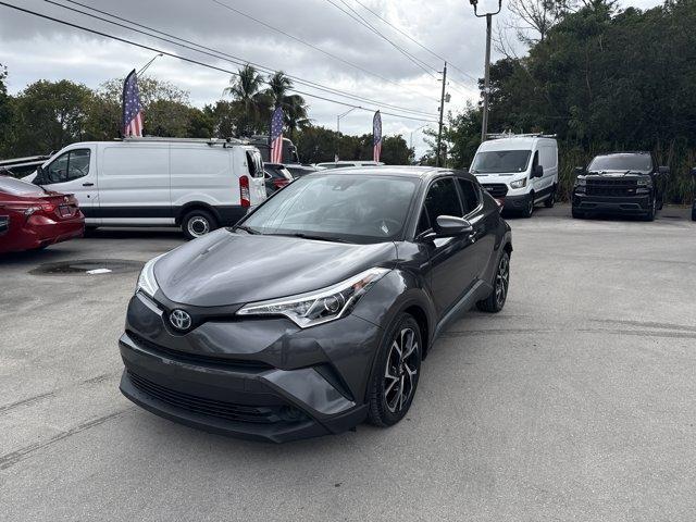 2018 Gray Toyota C-HR (NMTKHMBX3JR) with an 4 2.0 L engine, Variable transmission, located at 27610 S Dixie Hwy, Homestead, FL, 33032, (305) 749-2348, 25.510241, -80.438301 - KBB.com 10 Most Awarded Brands. Delivers 31 Highway MPG and 27 City MPG! This Toyota C-HR delivers a Regular Unleaded I-4 2.0 L/121 engine powering this Variable transmission. Wing Spoiler, Wheels w/Machined w/Painted Accents Accents, Variable Intermittent Wipers.* This Toyota C-HR Features the Foll - Photo#0