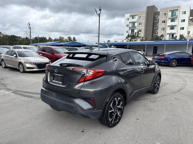2018 Gray Toyota C-HR (NMTKHMBX3JR) with an 4 2.0 L engine, Variable transmission, located at 27610 S Dixie Hwy, Homestead, FL, 33032, (305) 749-2348, 25.510241, -80.438301 - KBB.com 10 Most Awarded Brands. Delivers 31 Highway MPG and 27 City MPG! This Toyota C-HR delivers a Regular Unleaded I-4 2.0 L/121 engine powering this Variable transmission. Wing Spoiler, Wheels w/Machined w/Painted Accents Accents, Variable Intermittent Wipers.* This Toyota C-HR Features the Foll - Photo#4