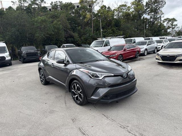 2018 Gray Toyota C-HR (NMTKHMBX3JR) with an 4 2.0 L engine, Variable transmission, located at 27610 S Dixie Hwy, Homestead, FL, 33032, (305) 749-2348, 25.510241, -80.438301 - KBB.com 10 Most Awarded Brands. Delivers 31 Highway MPG and 27 City MPG! This Toyota C-HR delivers a Regular Unleaded I-4 2.0 L/121 engine powering this Variable transmission. Wing Spoiler, Wheels w/Machined w/Painted Accents Accents, Variable Intermittent Wipers.* This Toyota C-HR Features the Foll - Photo#6