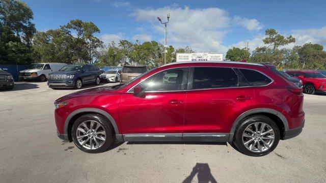 2019 Soul Red Crystal Metallic /Black Mazda CX-9 (JM3TCADY8K0) with an 4 2.5 L engine, Automatic transmission, located at 27610 S Dixie Hwy, Homestead, FL, 33032, (305) 749-2348, 25.510241, -80.438301 - KBB.com Brand Image Awards. Only 62,225 Miles! Boasts 28 Highway MPG and 22 City MPG! This Mazda CX-9 boasts a Intercooled Turbo Regular Unleaded I-4 2.5 L/152 engine powering this Automatic transmission. Wireless Phone Connectivity, Wheels w/Silver Accents, Trunk/Hatch Auto-Latch.*This Mazda CX-9 C - Photo#1