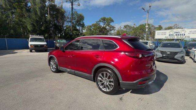 2019 Soul Red Crystal Metallic /Black Mazda CX-9 (JM3TCADY8K0) with an 4 2.5 L engine, Automatic transmission, located at 27610 S Dixie Hwy, Homestead, FL, 33032, (305) 749-2348, 25.510241, -80.438301 - KBB.com Brand Image Awards. Only 62,225 Miles! Boasts 28 Highway MPG and 22 City MPG! This Mazda CX-9 boasts a Intercooled Turbo Regular Unleaded I-4 2.5 L/152 engine powering this Automatic transmission. Wireless Phone Connectivity, Wheels w/Silver Accents, Trunk/Hatch Auto-Latch.*This Mazda CX-9 C - Photo#2