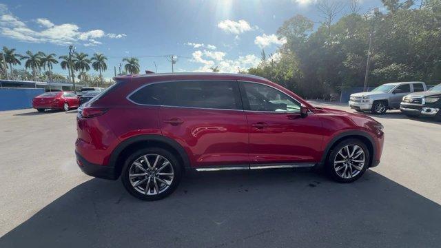 2019 Soul Red Crystal Metallic /Black Mazda CX-9 (JM3TCADY8K0) with an 4 2.5 L engine, Automatic transmission, located at 27610 S Dixie Hwy, Homestead, FL, 33032, (305) 749-2348, 25.510241, -80.438301 - KBB.com Brand Image Awards. Only 62,225 Miles! Boasts 28 Highway MPG and 22 City MPG! This Mazda CX-9 boasts a Intercooled Turbo Regular Unleaded I-4 2.5 L/152 engine powering this Automatic transmission. Wireless Phone Connectivity, Wheels w/Silver Accents, Trunk/Hatch Auto-Latch.*This Mazda CX-9 C - Photo#5