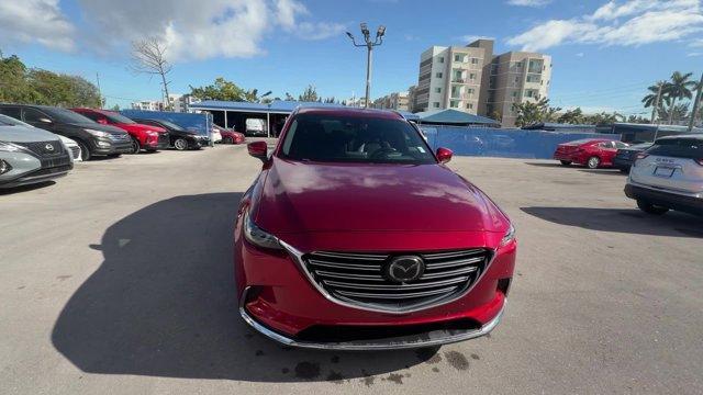 2019 Soul Red Crystal Metallic /Black Mazda CX-9 (JM3TCADY8K0) with an 4 2.5 L engine, Automatic transmission, located at 27610 S Dixie Hwy, Homestead, FL, 33032, (305) 749-2348, 25.510241, -80.438301 - KBB.com Brand Image Awards. Only 62,225 Miles! Boasts 28 Highway MPG and 22 City MPG! This Mazda CX-9 boasts a Intercooled Turbo Regular Unleaded I-4 2.5 L/152 engine powering this Automatic transmission. Wireless Phone Connectivity, Wheels w/Silver Accents, Trunk/Hatch Auto-Latch.*This Mazda CX-9 C - Photo#7