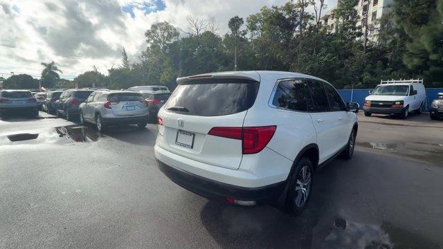 2018 White Honda Pilot (5FNYF5H31JB) with an 6 3.5 L engine, Automatic transmission, located at 27610 S Dixie Hwy, Homestead, FL, 33032, (305) 749-2348, 25.510241, -80.438301 - KBB.com Best Buy Awards. Scores 27 Highway MPG and 19 City MPG! This Honda Pilot delivers a Regular Unleaded V-6 3.5 L/212 engine powering this Automatic transmission. Wireless Phone Connectivity, Window Grid Antenna, Wheels: 18 Alloy.* This Honda Pilot Features the Following Options *VSA Electronic - Photo#4