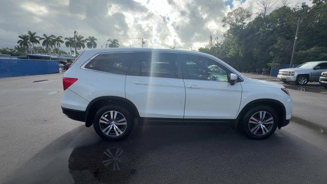 2018 White Honda Pilot (5FNYF5H31JB) with an 6 3.5 L engine, Automatic transmission, located at 27610 S Dixie Hwy, Homestead, FL, 33032, (305) 749-2348, 25.510241, -80.438301 - KBB.com Best Buy Awards. Scores 27 Highway MPG and 19 City MPG! This Honda Pilot delivers a Regular Unleaded V-6 3.5 L/212 engine powering this Automatic transmission. Wireless Phone Connectivity, Window Grid Antenna, Wheels: 18 Alloy.* This Honda Pilot Features the Following Options *VSA Electronic - Photo#5
