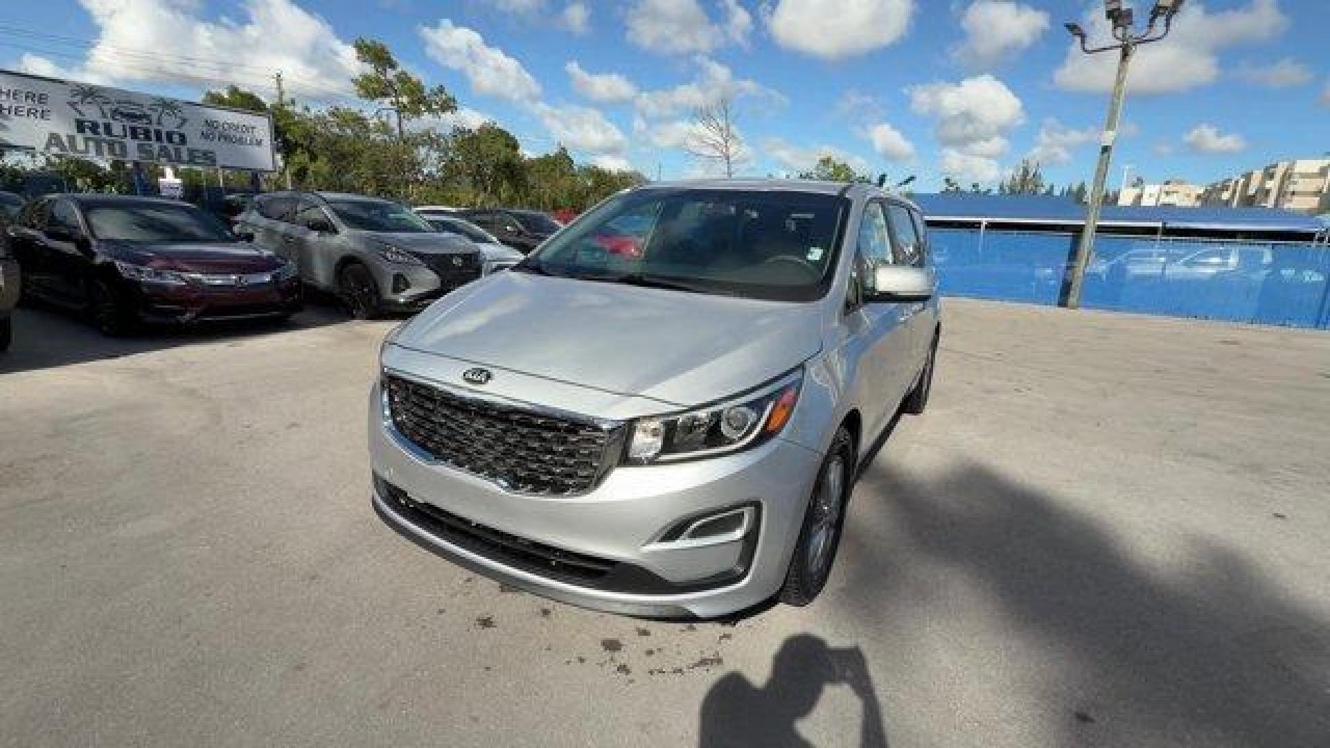 2021 Silky Silver /Gray Kia Sedona (KNDMB5C18M6) with an 6 3.3 L engine, Automatic transmission, located at 27610 S Dixie Hwy, Homestead, FL, 33032, (305) 749-2348, 25.510241, -80.438301 - Delivers 24 Highway MPG and 18 City MPG! This Kia Sedona boasts a Regular Unleaded V-6 3.3 L/204 engine powering this Automatic transmission. SILKY SILVER, CARPETED FLOOR MATS, Variable Intermittent Wipers.* This Kia Sedona Features the Following Options *Urethane Gear Shifter Material, Trip Compute - Photo#0