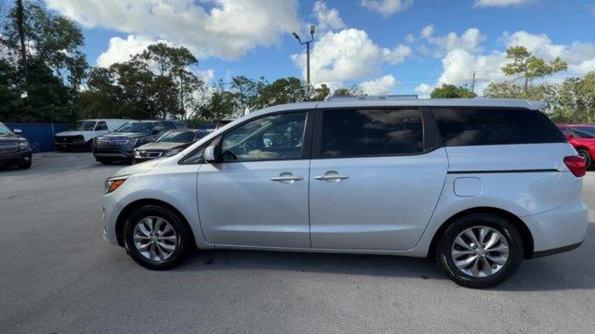 2021 Silky Silver /Gray Kia Sedona (KNDMB5C18M6) with an 6 3.3 L engine, Automatic transmission, located at 27610 S Dixie Hwy, Homestead, FL, 33032, (305) 749-2348, 25.510241, -80.438301 - Delivers 24 Highway MPG and 18 City MPG! This Kia Sedona boasts a Regular Unleaded V-6 3.3 L/204 engine powering this Automatic transmission. SILKY SILVER, CARPETED FLOOR MATS, Variable Intermittent Wipers.* This Kia Sedona Features the Following Options *Urethane Gear Shifter Material, Trip Compute - Photo#1