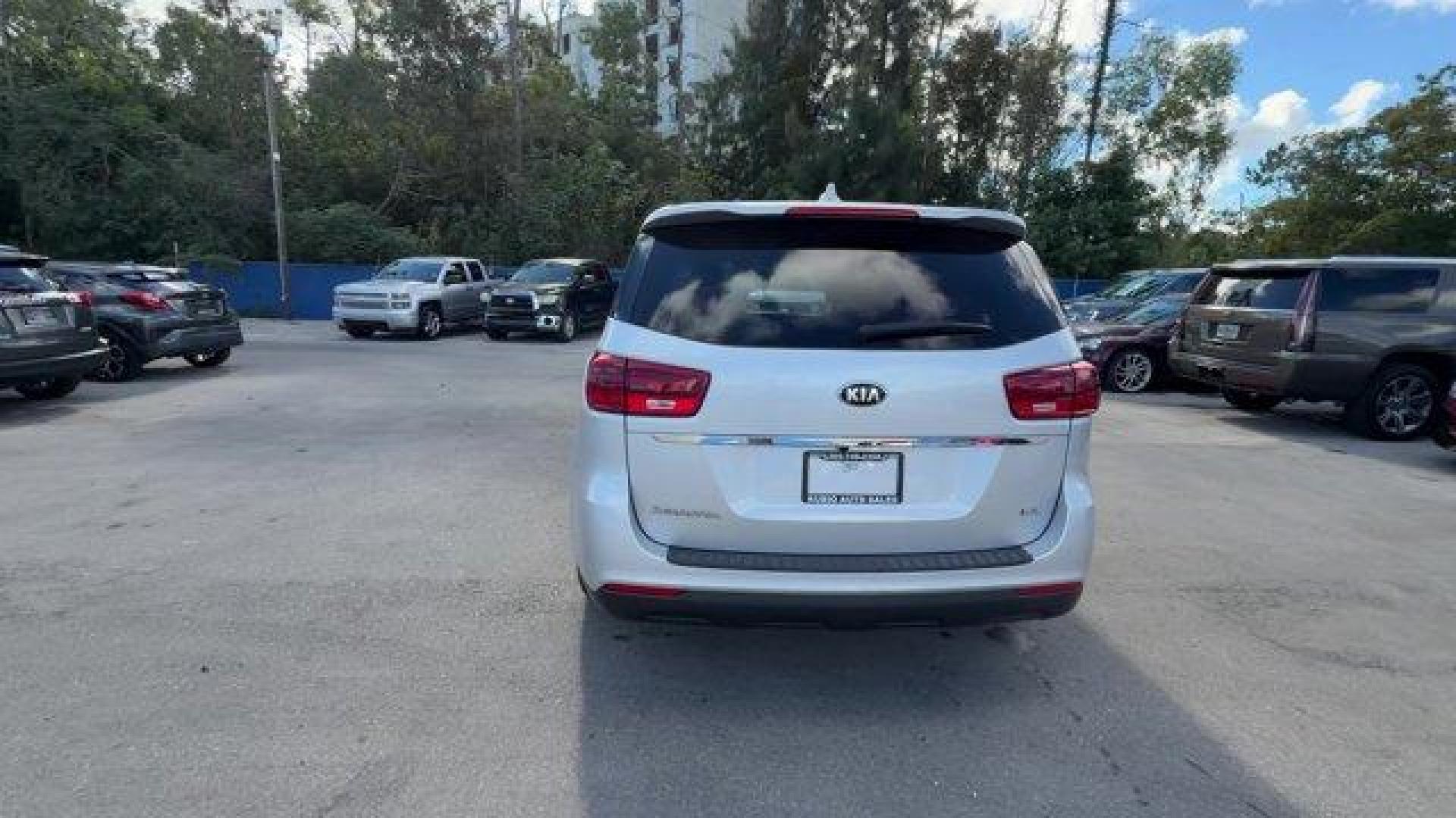 2021 Silky Silver /Gray Kia Sedona (KNDMB5C18M6) with an 6 3.3 L engine, Automatic transmission, located at 27610 S Dixie Hwy, Homestead, FL, 33032, (305) 749-2348, 25.510241, -80.438301 - Delivers 24 Highway MPG and 18 City MPG! This Kia Sedona boasts a Regular Unleaded V-6 3.3 L/204 engine powering this Automatic transmission. SILKY SILVER, CARPETED FLOOR MATS, Variable Intermittent Wipers.* This Kia Sedona Features the Following Options *Urethane Gear Shifter Material, Trip Compute - Photo#3
