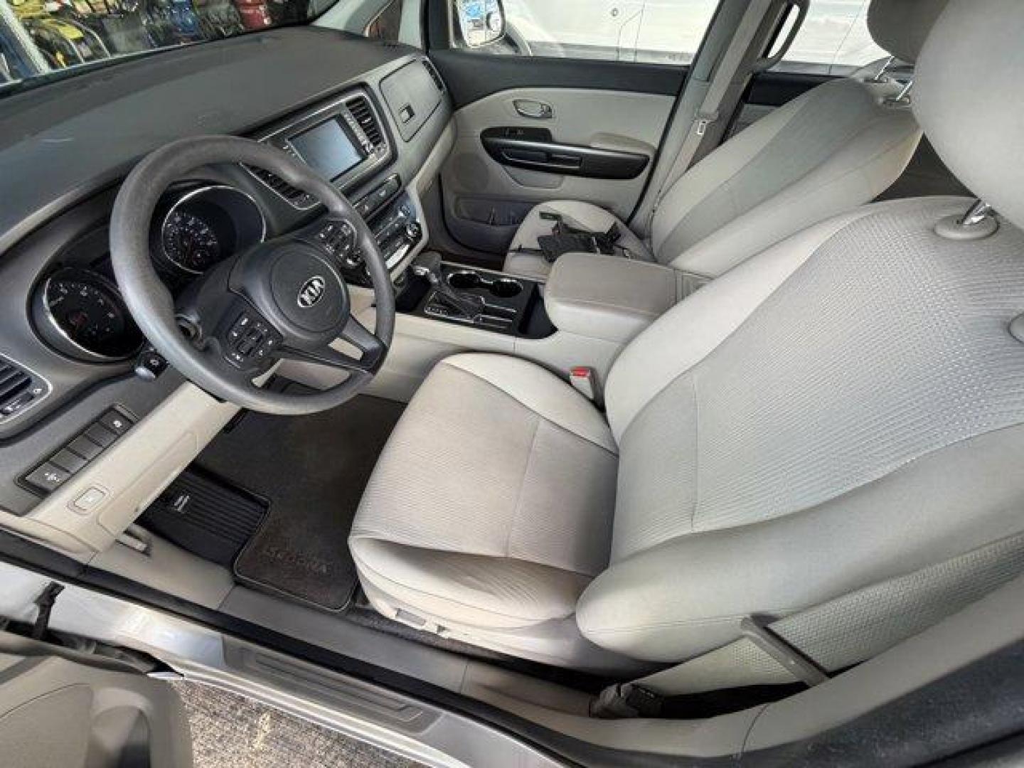 2021 Silky Silver /Gray Kia Sedona (KNDMB5C18M6) with an 6 3.3 L engine, Automatic transmission, located at 27610 S Dixie Hwy, Homestead, FL, 33032, (305) 749-2348, 25.510241, -80.438301 - Delivers 24 Highway MPG and 18 City MPG! This Kia Sedona boasts a Regular Unleaded V-6 3.3 L/204 engine powering this Automatic transmission. SILKY SILVER, CARPETED FLOOR MATS, Variable Intermittent Wipers.* This Kia Sedona Features the Following Options *Urethane Gear Shifter Material, Trip Compute - Photo#11