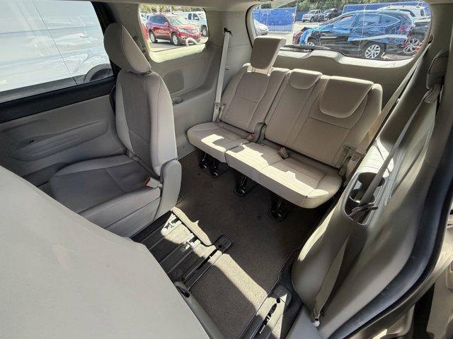 2021 Silky Silver /Gray Kia Sedona (KNDMB5C18M6) with an 6 3.3 L engine, Automatic transmission, located at 27610 S Dixie Hwy, Homestead, FL, 33032, (305) 749-2348, 25.510241, -80.438301 - Delivers 24 Highway MPG and 18 City MPG! This Kia Sedona boasts a Regular Unleaded V-6 3.3 L/204 engine powering this Automatic transmission. SILKY SILVER, CARPETED FLOOR MATS, Variable Intermittent Wipers.* This Kia Sedona Features the Following Options *Urethane Gear Shifter Material, Trip Compute - Photo#13