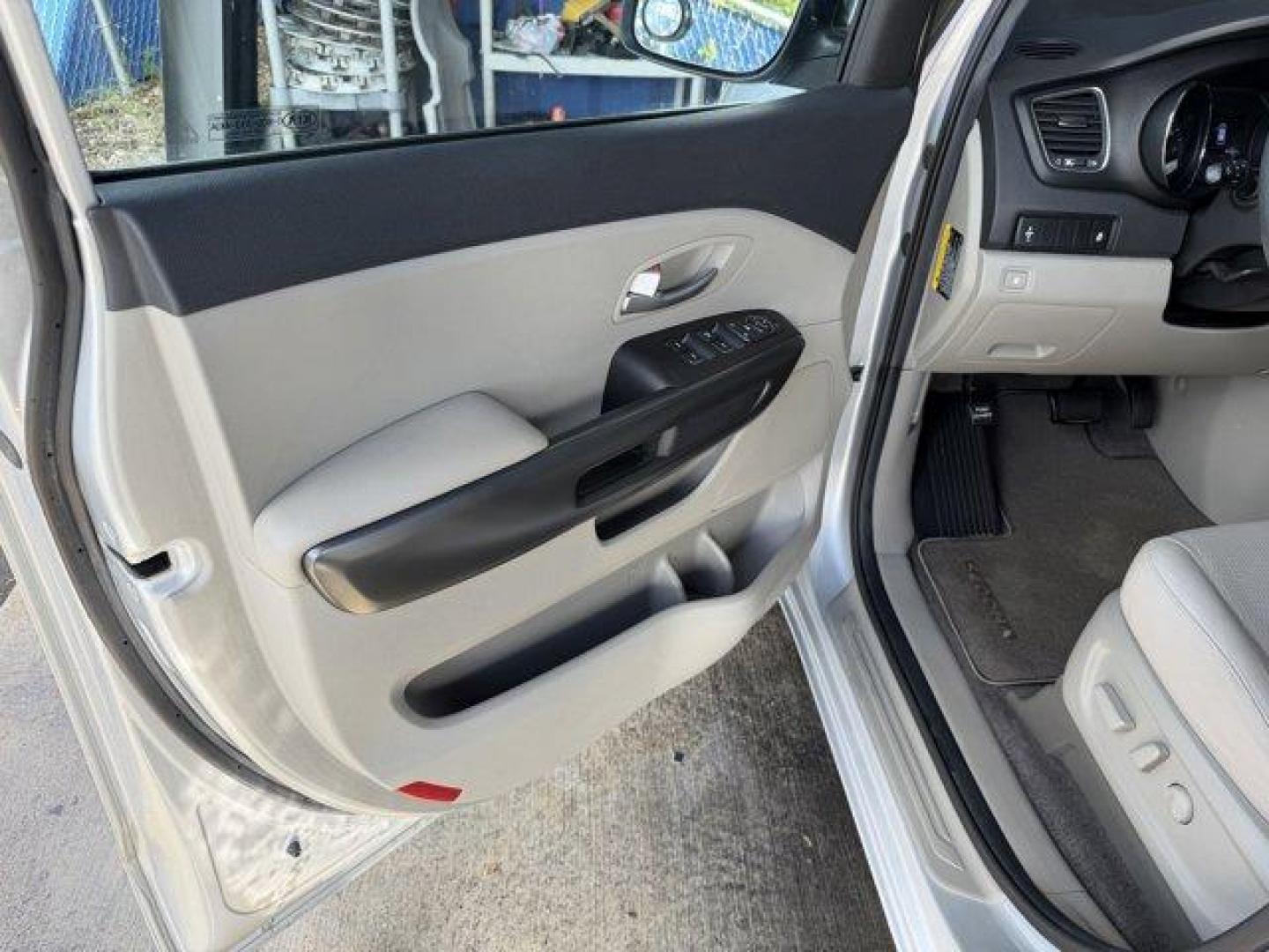 2021 Silky Silver /Gray Kia Sedona (KNDMB5C18M6) with an 6 3.3 L engine, Automatic transmission, located at 27610 S Dixie Hwy, Homestead, FL, 33032, (305) 749-2348, 25.510241, -80.438301 - Delivers 24 Highway MPG and 18 City MPG! This Kia Sedona boasts a Regular Unleaded V-6 3.3 L/204 engine powering this Automatic transmission. SILKY SILVER, CARPETED FLOOR MATS, Variable Intermittent Wipers.* This Kia Sedona Features the Following Options *Urethane Gear Shifter Material, Trip Compute - Photo#14