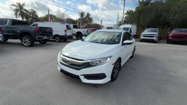 2017 White Honda Civic Sedan (2HGFC2F78HH) with an 4 2.0 L engine, Variable transmission, located at 27610 S Dixie Hwy, Homestead, FL, 33032, (305) 749-2348, 25.510241, -80.438301 - IIHS Top Safety Pick. Delivers 40 Highway MPG and 31 City MPG! This Honda Civic Sedan delivers a Regular Unleaded I-4 2.0 L/122 engine powering this Variable transmission. Wireless Phone Connectivity, Window Grid Antenna, Wheels: 16 Alloy.* This Honda Civic Sedan Features the Following Options *Whee - Photo#0