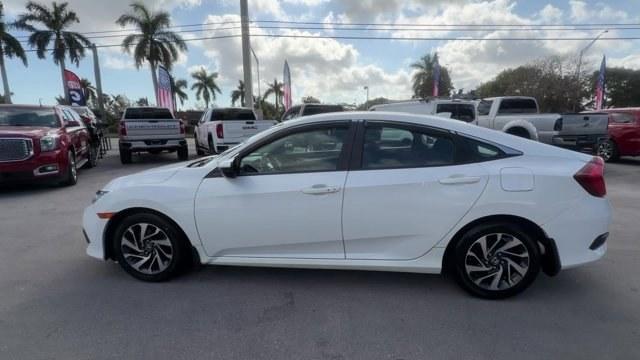 2017 White Honda Civic Sedan (2HGFC2F78HH) with an 4 2.0 L engine, Variable transmission, located at 27610 S Dixie Hwy, Homestead, FL, 33032, (305) 749-2348, 25.510241, -80.438301 - IIHS Top Safety Pick. Delivers 40 Highway MPG and 31 City MPG! This Honda Civic Sedan delivers a Regular Unleaded I-4 2.0 L/122 engine powering this Variable transmission. Wireless Phone Connectivity, Window Grid Antenna, Wheels: 16 Alloy.* This Honda Civic Sedan Features the Following Options *Whee - Photo#1