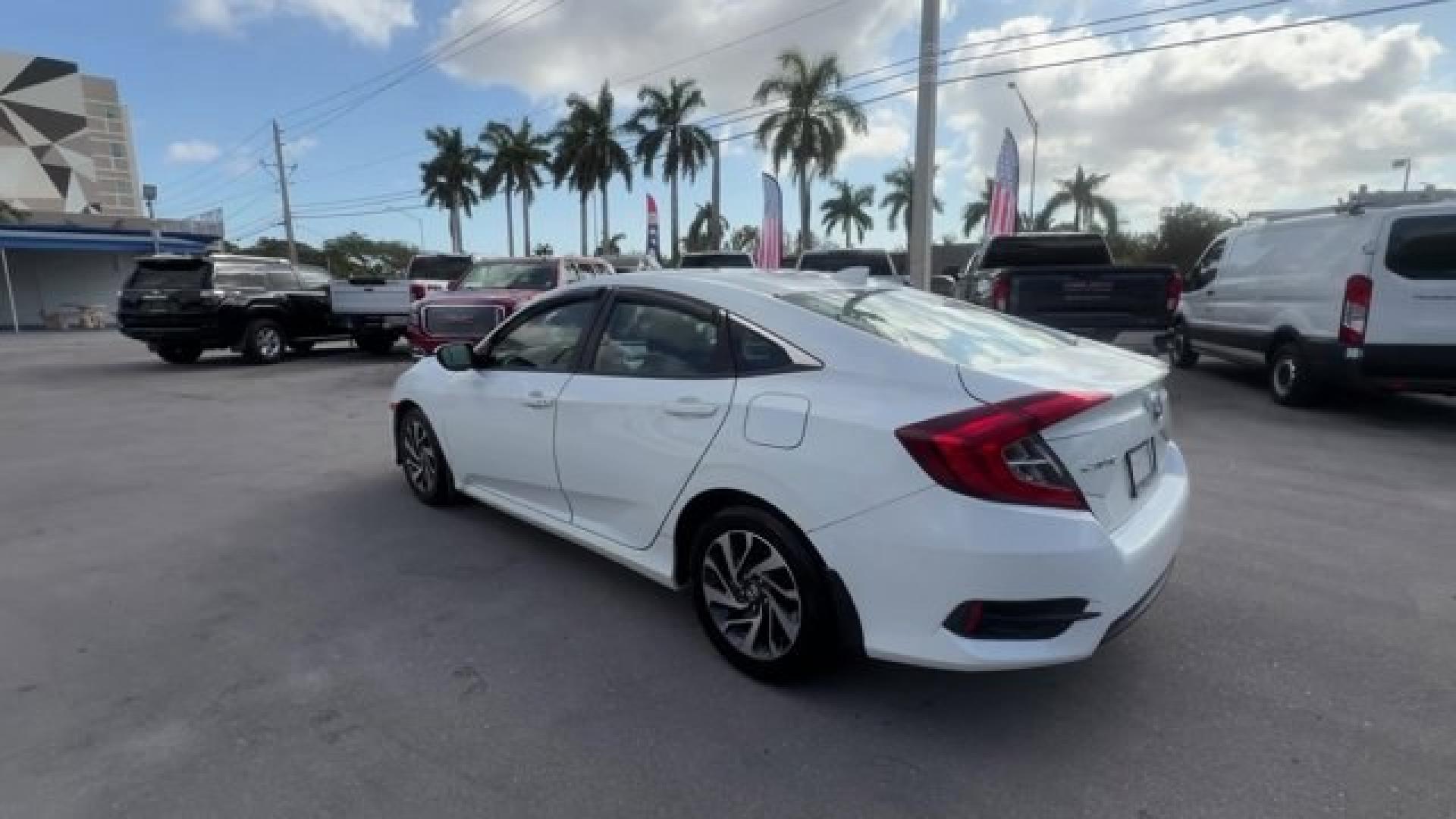 2017 White Honda Civic Sedan (2HGFC2F78HH) with an 4 2.0 L engine, Variable transmission, located at 27610 S Dixie Hwy, Homestead, FL, 33032, (305) 749-2348, 25.510241, -80.438301 - IIHS Top Safety Pick. Delivers 40 Highway MPG and 31 City MPG! This Honda Civic Sedan delivers a Regular Unleaded I-4 2.0 L/122 engine powering this Variable transmission. Wireless Phone Connectivity, Window Grid Antenna, Wheels: 16 Alloy.* This Honda Civic Sedan Features the Following Options *Whee - Photo#2