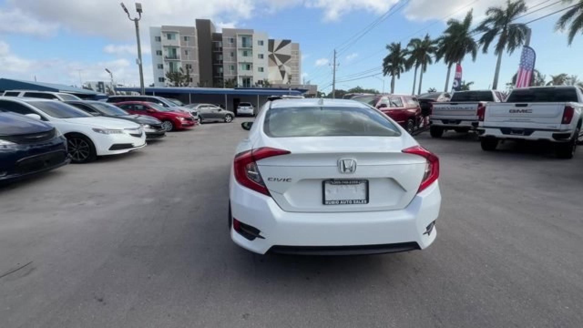 2017 White Honda Civic Sedan (2HGFC2F78HH) with an 4 2.0 L engine, Variable transmission, located at 27610 S Dixie Hwy, Homestead, FL, 33032, (305) 749-2348, 25.510241, -80.438301 - IIHS Top Safety Pick. Delivers 40 Highway MPG and 31 City MPG! This Honda Civic Sedan delivers a Regular Unleaded I-4 2.0 L/122 engine powering this Variable transmission. Wireless Phone Connectivity, Window Grid Antenna, Wheels: 16 Alloy.* This Honda Civic Sedan Features the Following Options *Whee - Photo#3