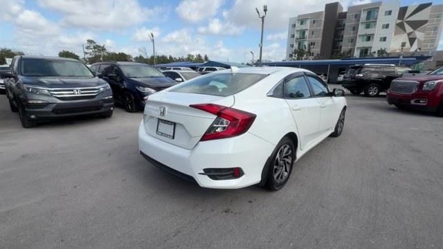 2017 White Honda Civic Sedan (2HGFC2F78HH) with an 4 2.0 L engine, Variable transmission, located at 27610 S Dixie Hwy, Homestead, FL, 33032, (305) 749-2348, 25.510241, -80.438301 - IIHS Top Safety Pick. Delivers 40 Highway MPG and 31 City MPG! This Honda Civic Sedan delivers a Regular Unleaded I-4 2.0 L/122 engine powering this Variable transmission. Wireless Phone Connectivity, Window Grid Antenna, Wheels: 16 Alloy.* This Honda Civic Sedan Features the Following Options *Whee - Photo#4