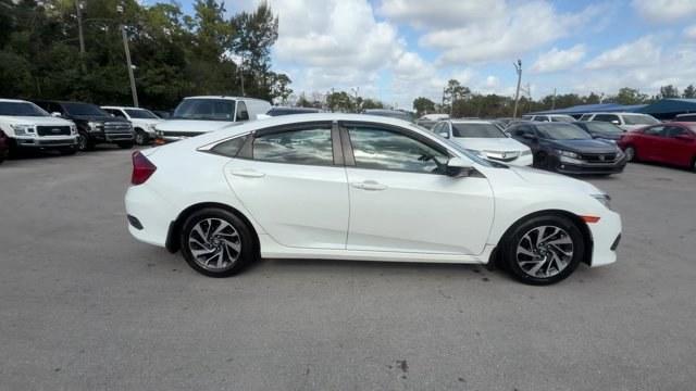 2017 White Honda Civic Sedan (2HGFC2F78HH) with an 4 2.0 L engine, Variable transmission, located at 27610 S Dixie Hwy, Homestead, FL, 33032, (305) 749-2348, 25.510241, -80.438301 - IIHS Top Safety Pick. Delivers 40 Highway MPG and 31 City MPG! This Honda Civic Sedan delivers a Regular Unleaded I-4 2.0 L/122 engine powering this Variable transmission. Wireless Phone Connectivity, Window Grid Antenna, Wheels: 16 Alloy.* This Honda Civic Sedan Features the Following Options *Whee - Photo#5