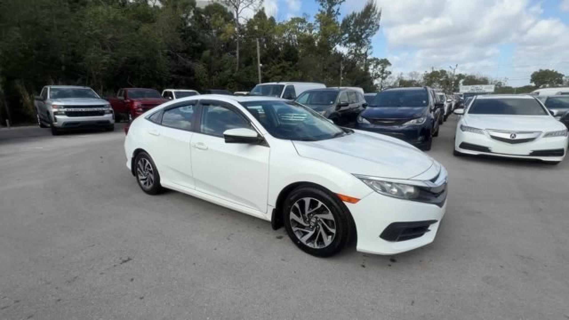 2017 White Honda Civic Sedan (2HGFC2F78HH) with an 4 2.0 L engine, Variable transmission, located at 27610 S Dixie Hwy, Homestead, FL, 33032, (305) 749-2348, 25.510241, -80.438301 - IIHS Top Safety Pick. Delivers 40 Highway MPG and 31 City MPG! This Honda Civic Sedan delivers a Regular Unleaded I-4 2.0 L/122 engine powering this Variable transmission. Wireless Phone Connectivity, Window Grid Antenna, Wheels: 16 Alloy.* This Honda Civic Sedan Features the Following Options *Whee - Photo#6