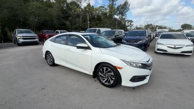 2017 White Honda Civic Sedan (2HGFC2F78HH) with an 4 2.0 L engine, Variable transmission, located at 27610 S Dixie Hwy, Homestead, FL, 33032, (305) 749-2348, 25.510241, -80.438301 - IIHS Top Safety Pick. Delivers 40 Highway MPG and 31 City MPG! This Honda Civic Sedan delivers a Regular Unleaded I-4 2.0 L/122 engine powering this Variable transmission. Wireless Phone Connectivity, Window Grid Antenna, Wheels: 16 Alloy.* This Honda Civic Sedan Features the Following Options *Whee - Photo#6