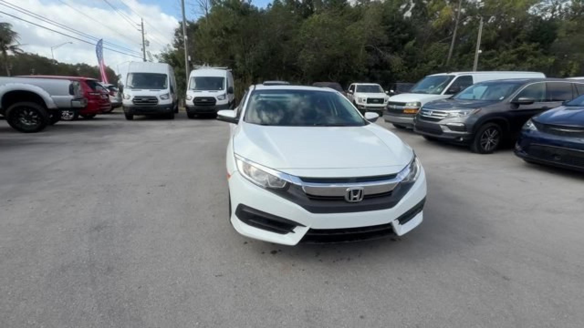 2017 White Honda Civic Sedan (2HGFC2F78HH) with an 4 2.0 L engine, Variable transmission, located at 27610 S Dixie Hwy, Homestead, FL, 33032, (305) 749-2348, 25.510241, -80.438301 - IIHS Top Safety Pick. Delivers 40 Highway MPG and 31 City MPG! This Honda Civic Sedan delivers a Regular Unleaded I-4 2.0 L/122 engine powering this Variable transmission. Wireless Phone Connectivity, Window Grid Antenna, Wheels: 16 Alloy.* This Honda Civic Sedan Features the Following Options *Whee - Photo#7