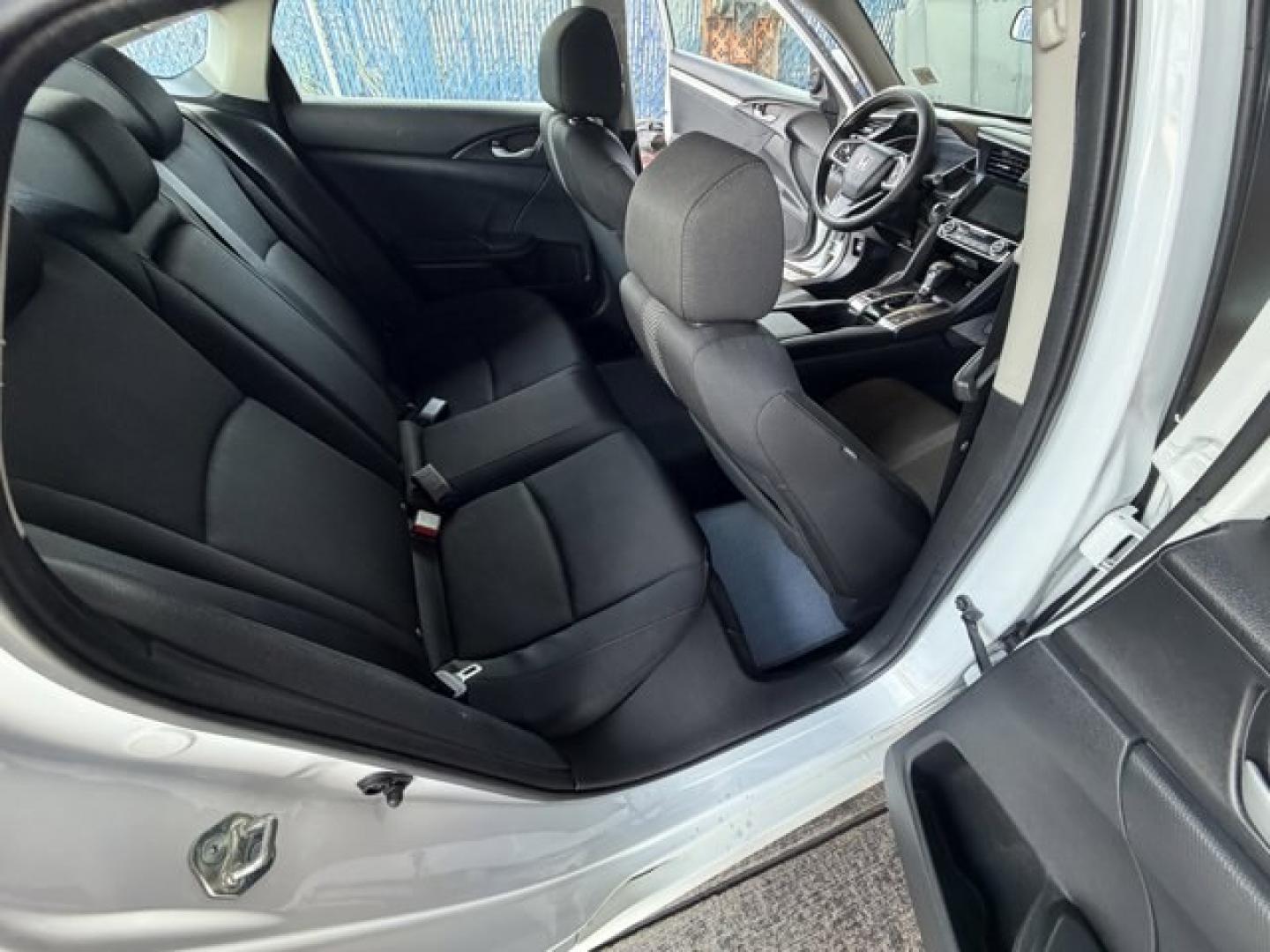 2017 White Honda Civic Sedan (2HGFC2F78HH) with an 4 2.0 L engine, Variable transmission, located at 27610 S Dixie Hwy, Homestead, FL, 33032, (305) 749-2348, 25.510241, -80.438301 - IIHS Top Safety Pick. Delivers 40 Highway MPG and 31 City MPG! This Honda Civic Sedan delivers a Regular Unleaded I-4 2.0 L/122 engine powering this Variable transmission. Wireless Phone Connectivity, Window Grid Antenna, Wheels: 16 Alloy.* This Honda Civic Sedan Features the Following Options *Whee - Photo#12