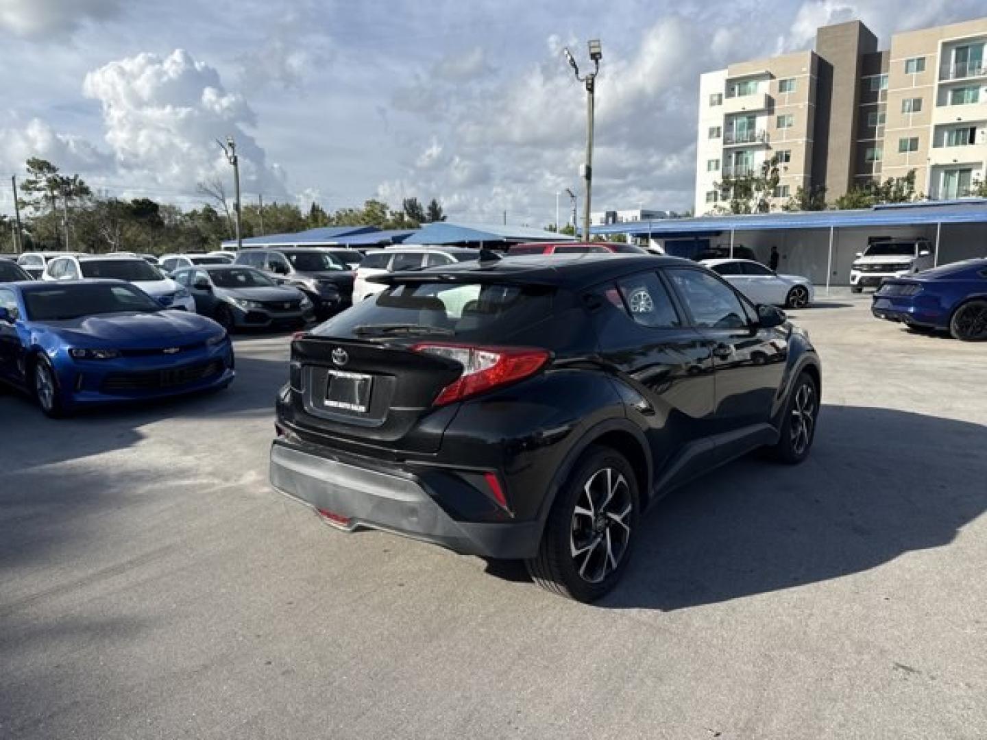 2018 Black Toyota C-HR (NMTKHMBX4JR) with an 4 2.0 L engine, Variable transmission, located at 27610 S Dixie Hwy, Homestead, FL, 33032, (305) 749-2348, 25.510241, -80.438301 - KBB.com Best Resale Value Awards. Boasts 31 Highway MPG and 27 City MPG! This Toyota C-HR boasts a Regular Unleaded I-4 2.0 L/121 engine powering this Variable transmission. Wing Spoiler, Wheels: 18 Sport Alloy, Wheels w/Machined w/Painted Accents Accents.* This Toyota C-HR Features the Following Op - Photo#4