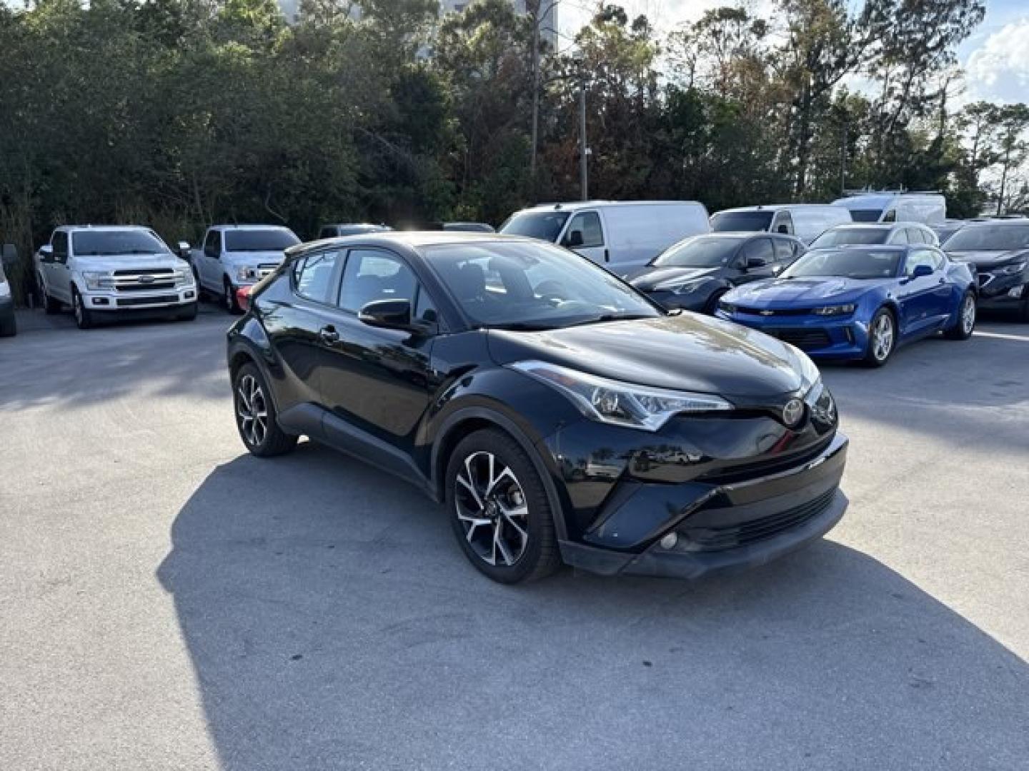 2018 Black Toyota C-HR (NMTKHMBX4JR) with an 4 2.0 L engine, Variable transmission, located at 27610 S Dixie Hwy, Homestead, FL, 33032, (305) 749-2348, 25.510241, -80.438301 - KBB.com Best Resale Value Awards. Boasts 31 Highway MPG and 27 City MPG! This Toyota C-HR boasts a Regular Unleaded I-4 2.0 L/121 engine powering this Variable transmission. Wing Spoiler, Wheels: 18 Sport Alloy, Wheels w/Machined w/Painted Accents Accents.* This Toyota C-HR Features the Following Op - Photo#6