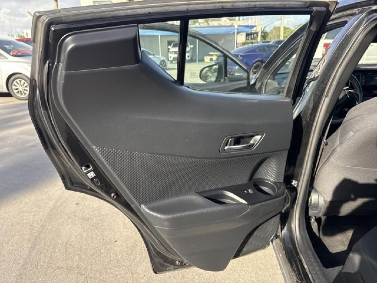 2018 Black Toyota C-HR (NMTKHMBX4JR) with an 4 2.0 L engine, Variable transmission, located at 27610 S Dixie Hwy, Homestead, FL, 33032, (305) 749-2348, 25.510241, -80.438301 - KBB.com Best Resale Value Awards. Boasts 31 Highway MPG and 27 City MPG! This Toyota C-HR boasts a Regular Unleaded I-4 2.0 L/121 engine powering this Variable transmission. Wing Spoiler, Wheels: 18 Sport Alloy, Wheels w/Machined w/Painted Accents Accents.* This Toyota C-HR Features the Following Op - Photo#16