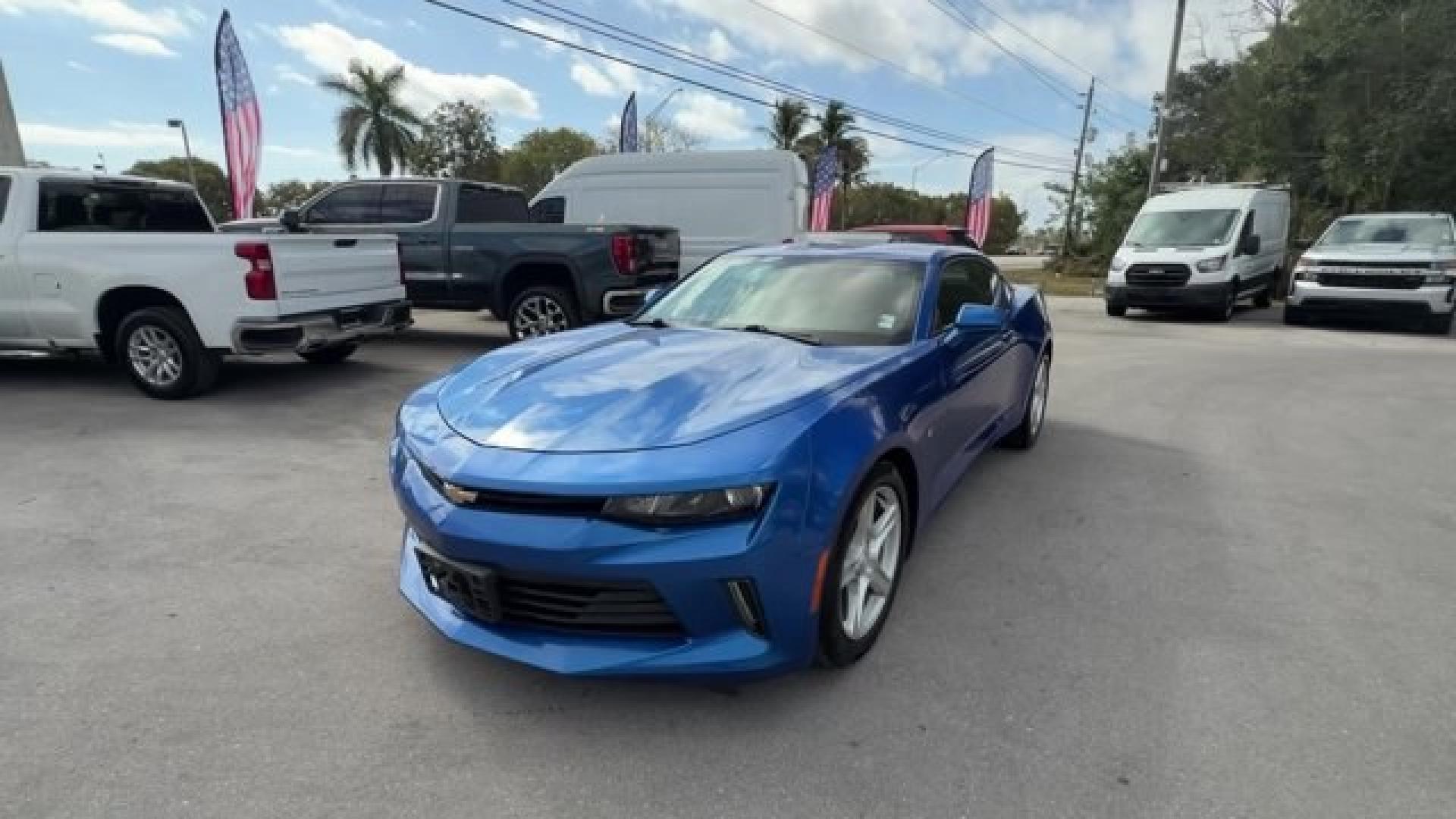 2016 Hyper Blue Metallic /Jet Black Chevrolet Camaro (1G1FA1RX8G0) with an 4 2.0L engine, Manual transmission, located at 27610 S Dixie Hwy, Homestead, FL, 33032, (305) 749-2348, 25.510241, -80.438301 - Ward's 10 Best Engines. Only 95,841 Miles! Boasts 30 Highway MPG and 21 City MPG! This Chevrolet Camaro delivers a Gas I4 2.0L/122 engine powering this Manual transmission. WHEELS, 18 (45.7 CM) SILVER-PAINTED ALUMINUM (STD), TRANSMISSION, 6-SPEED MANUAL (STD), TIRES, 245/50R18, BLACKWALL, ALL-SEASON- Photo#0