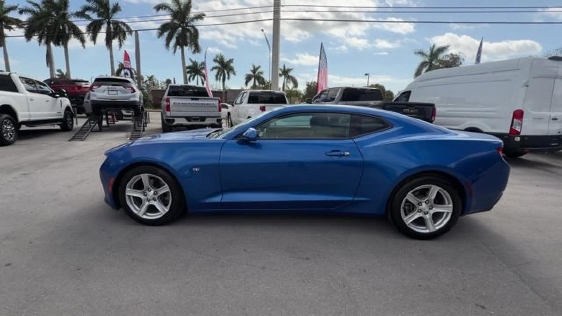 2016 Hyper Blue Metallic /Jet Black Chevrolet Camaro (1G1FA1RX8G0) with an 4 2.0L engine, Manual transmission, located at 27610 S Dixie Hwy, Homestead, FL, 33032, (305) 749-2348, 25.510241, -80.438301 - Ward's 10 Best Engines. Only 95,841 Miles! Boasts 30 Highway MPG and 21 City MPG! This Chevrolet Camaro delivers a Gas I4 2.0L/122 engine powering this Manual transmission. WHEELS, 18 (45.7 CM) SILVER-PAINTED ALUMINUM (STD), TRANSMISSION, 6-SPEED MANUAL (STD), TIRES, 245/50R18, BLACKWALL, ALL-SEASON- Photo#1