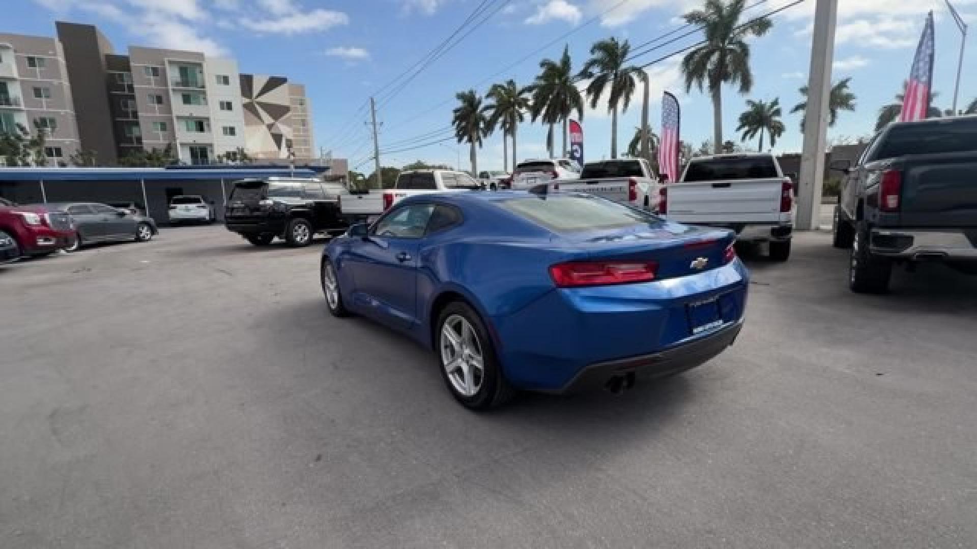 2016 Hyper Blue Metallic /Jet Black Chevrolet Camaro (1G1FA1RX8G0) with an 4 2.0L engine, Manual transmission, located at 27610 S Dixie Hwy, Homestead, FL, 33032, (305) 749-2348, 25.510241, -80.438301 - Ward's 10 Best Engines. Only 95,841 Miles! Boasts 30 Highway MPG and 21 City MPG! This Chevrolet Camaro delivers a Gas I4 2.0L/122 engine powering this Manual transmission. WHEELS, 18 (45.7 CM) SILVER-PAINTED ALUMINUM (STD), TRANSMISSION, 6-SPEED MANUAL (STD), TIRES, 245/50R18, BLACKWALL, ALL-SEASON- Photo#2