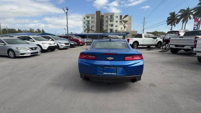 2016 Hyper Blue Metallic /Jet Black Chevrolet Camaro (1G1FA1RX8G0) with an 4 2.0L engine, Manual transmission, located at 27610 S Dixie Hwy, Homestead, FL, 33032, (305) 749-2348, 25.510241, -80.438301 - Ward's 10 Best Engines. Only 95,841 Miles! Boasts 30 Highway MPG and 21 City MPG! This Chevrolet Camaro delivers a Gas I4 2.0L/122 engine powering this Manual transmission. WHEELS, 18 (45.7 CM) SILVER-PAINTED ALUMINUM (STD), TRANSMISSION, 6-SPEED MANUAL (STD), TIRES, 245/50R18, BLACKWALL, ALL-SEASON - Photo#3