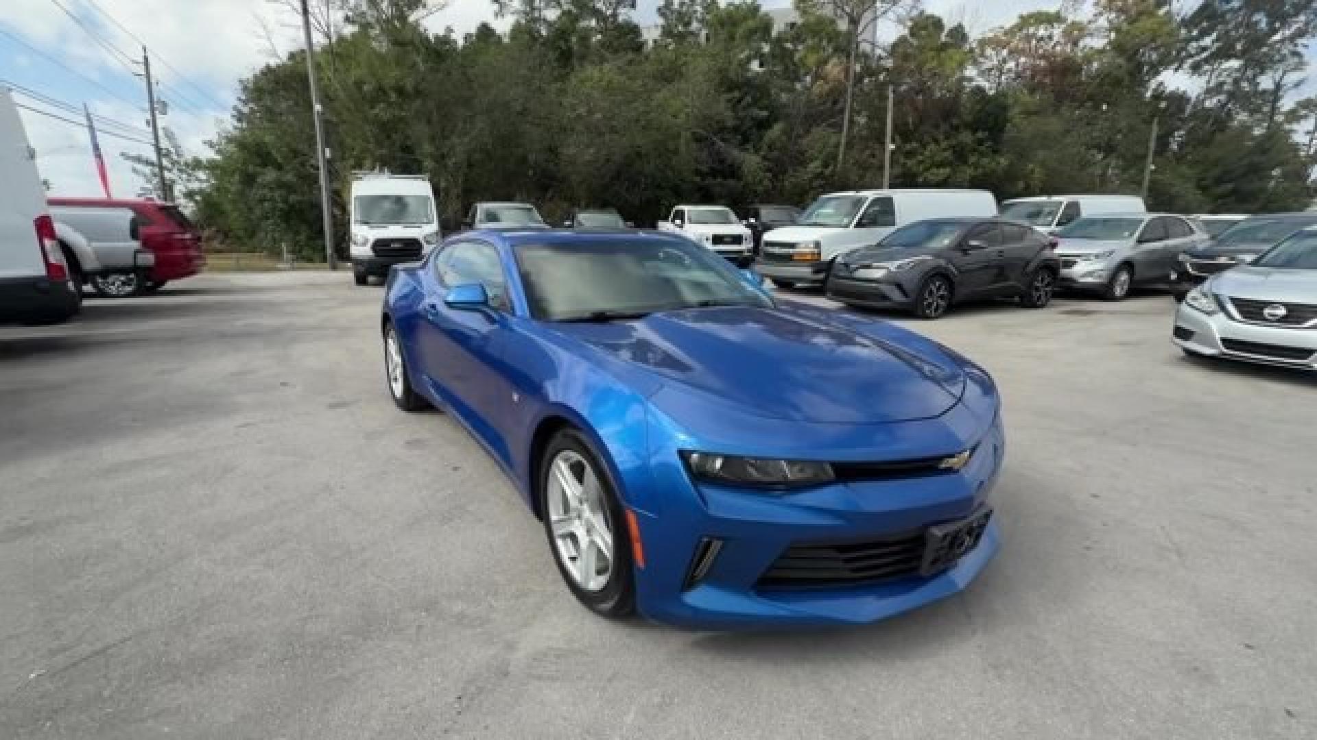 2016 Hyper Blue Metallic /Jet Black Chevrolet Camaro (1G1FA1RX8G0) with an 4 2.0L engine, Manual transmission, located at 27610 S Dixie Hwy, Homestead, FL, 33032, (305) 749-2348, 25.510241, -80.438301 - Ward's 10 Best Engines. Only 95,841 Miles! Boasts 30 Highway MPG and 21 City MPG! This Chevrolet Camaro delivers a Gas I4 2.0L/122 engine powering this Manual transmission. WHEELS, 18 (45.7 CM) SILVER-PAINTED ALUMINUM (STD), TRANSMISSION, 6-SPEED MANUAL (STD), TIRES, 245/50R18, BLACKWALL, ALL-SEASON- Photo#6