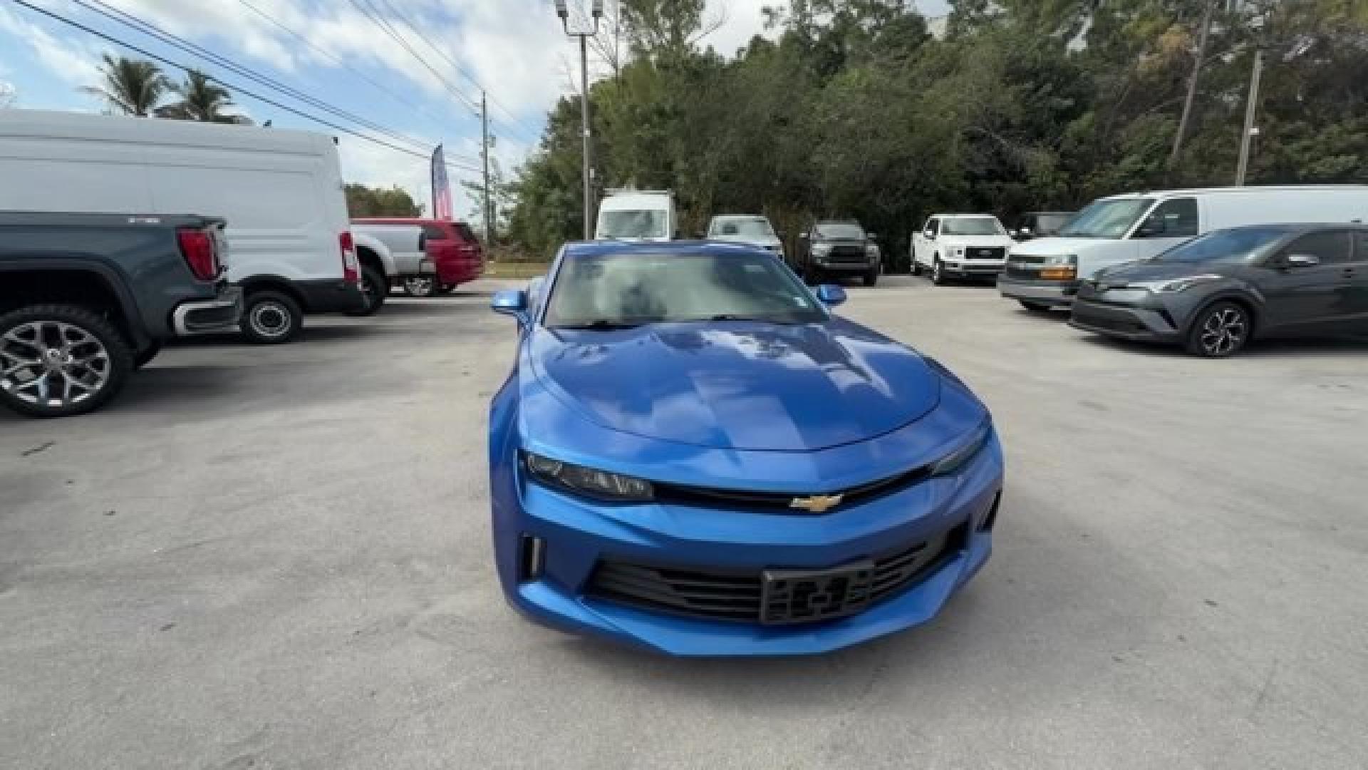 2016 Hyper Blue Metallic /Jet Black Chevrolet Camaro (1G1FA1RX8G0) with an 4 2.0L engine, Manual transmission, located at 27610 S Dixie Hwy, Homestead, FL, 33032, (305) 749-2348, 25.510241, -80.438301 - Ward's 10 Best Engines. Only 95,841 Miles! Boasts 30 Highway MPG and 21 City MPG! This Chevrolet Camaro delivers a Gas I4 2.0L/122 engine powering this Manual transmission. WHEELS, 18 (45.7 CM) SILVER-PAINTED ALUMINUM (STD), TRANSMISSION, 6-SPEED MANUAL (STD), TIRES, 245/50R18, BLACKWALL, ALL-SEASON- Photo#7