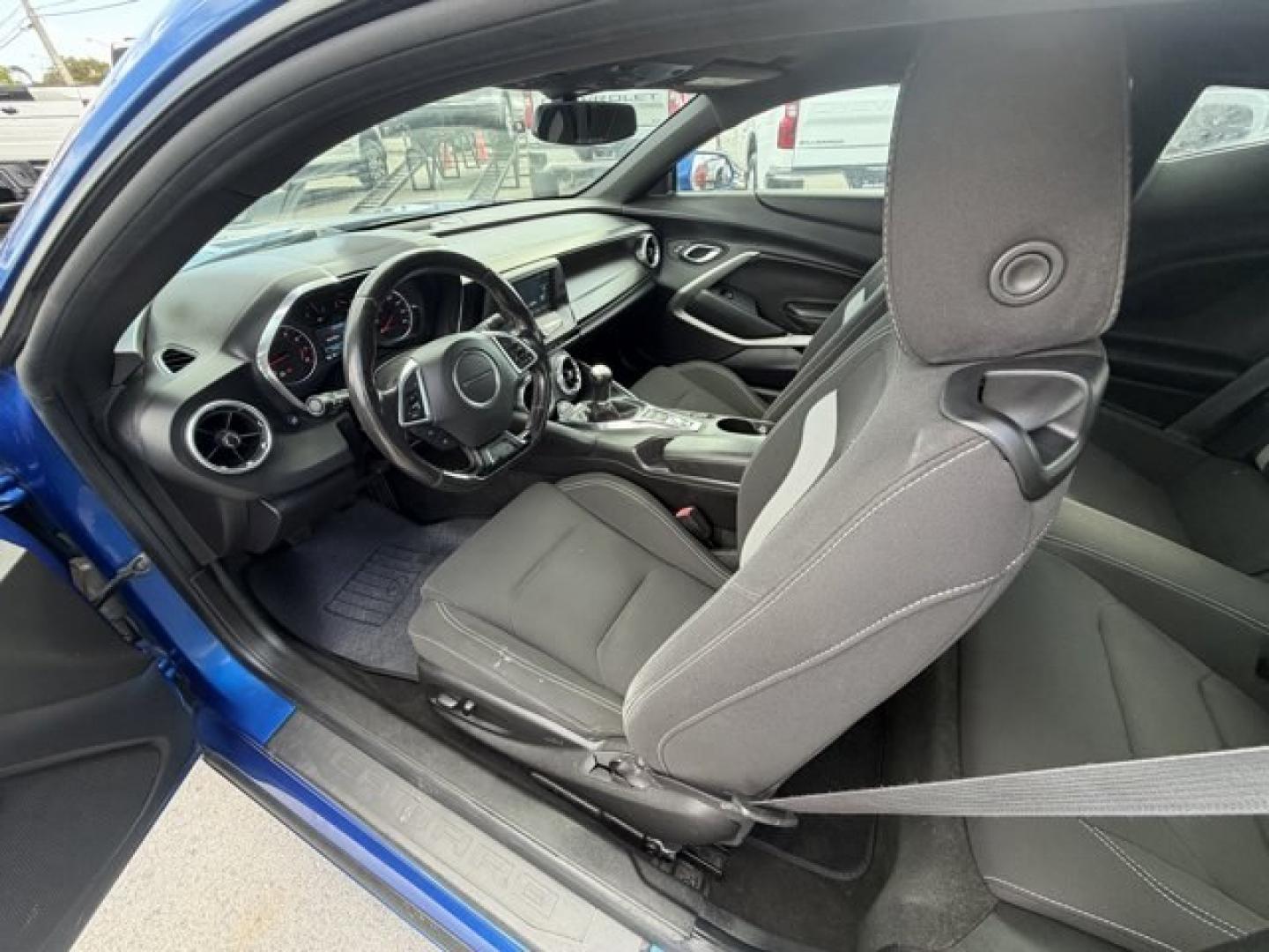 2016 Hyper Blue Metallic /Jet Black Chevrolet Camaro (1G1FA1RX8G0) with an 4 2.0L engine, Manual transmission, located at 27610 S Dixie Hwy, Homestead, FL, 33032, (305) 749-2348, 25.510241, -80.438301 - Ward's 10 Best Engines. Only 95,841 Miles! Boasts 30 Highway MPG and 21 City MPG! This Chevrolet Camaro delivers a Gas I4 2.0L/122 engine powering this Manual transmission. WHEELS, 18 (45.7 CM) SILVER-PAINTED ALUMINUM (STD), TRANSMISSION, 6-SPEED MANUAL (STD), TIRES, 245/50R18, BLACKWALL, ALL-SEASON- Photo#11