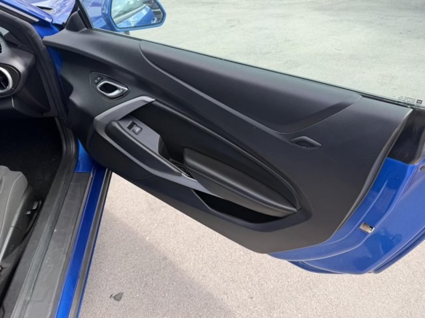 2016 Hyper Blue Metallic /Jet Black Chevrolet Camaro (1G1FA1RX8G0) with an 4 2.0L engine, Manual transmission, located at 27610 S Dixie Hwy, Homestead, FL, 33032, (305) 749-2348, 25.510241, -80.438301 - Ward's 10 Best Engines. Only 95,841 Miles! Boasts 30 Highway MPG and 21 City MPG! This Chevrolet Camaro delivers a Gas I4 2.0L/122 engine powering this Manual transmission. WHEELS, 18 (45.7 CM) SILVER-PAINTED ALUMINUM (STD), TRANSMISSION, 6-SPEED MANUAL (STD), TIRES, 245/50R18, BLACKWALL, ALL-SEASON- Photo#13