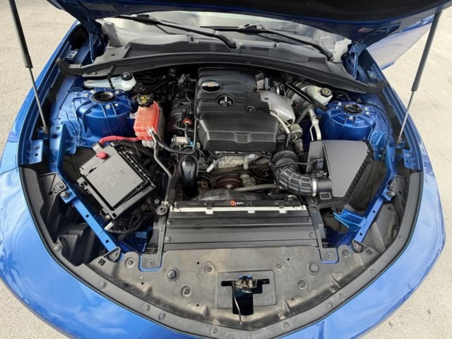 2016 Hyper Blue Metallic /Jet Black Chevrolet Camaro (1G1FA1RX8G0) with an 4 2.0L engine, Manual transmission, located at 27610 S Dixie Hwy, Homestead, FL, 33032, (305) 749-2348, 25.510241, -80.438301 - Ward's 10 Best Engines. Only 95,841 Miles! Boasts 30 Highway MPG and 21 City MPG! This Chevrolet Camaro delivers a Gas I4 2.0L/122 engine powering this Manual transmission. WHEELS, 18 (45.7 CM) SILVER-PAINTED ALUMINUM (STD), TRANSMISSION, 6-SPEED MANUAL (STD), TIRES, 245/50R18, BLACKWALL, ALL-SEASON- Photo#14