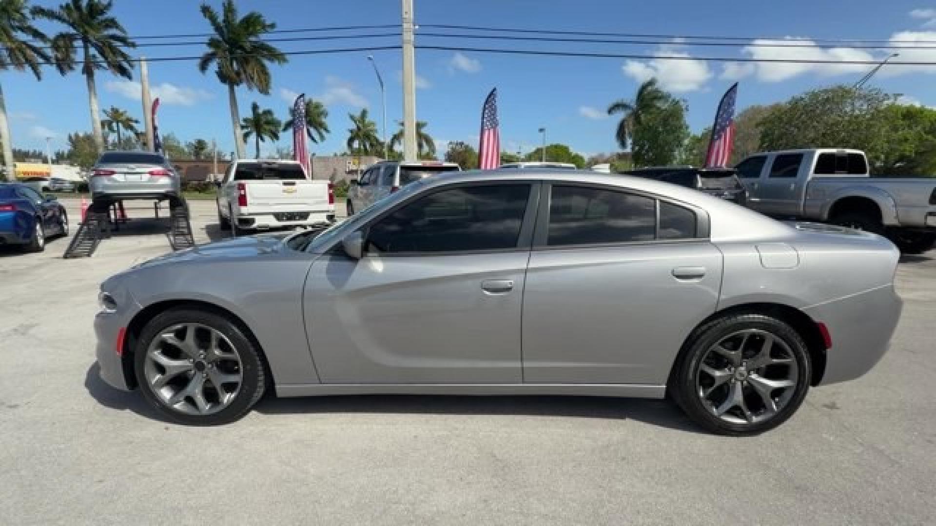 2018 Billet Clearcoat /Black Dodge Charger (2C3CDXHG9JH) with an 6 3.6 L engine, Automatic transmission, located at 27610 S Dixie Hwy, Homestead, FL, 33032, (305) 749-2348, 25.510241, -80.438301 - Boasts 30 Highway MPG and 19 City MPG! This Dodge Charger delivers a Regular Unleaded V-6 3.6 L/220 engine powering this Automatic transmission. WHEELS: 18 X 7.5 CAST ALUMINUM (STD), TRANSMISSION: 8-SPEED AUTOMATIC (845RE) (STD), TIRES: P235/55R18 AS PERFORMANCE (STD).* This Dodge Charger Features t - Photo#1