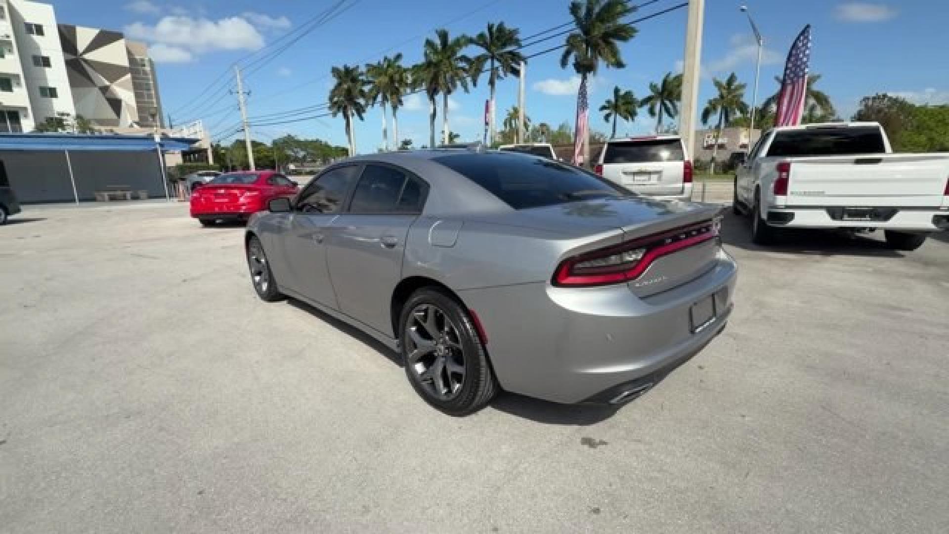 2018 Billet Clearcoat /Black Dodge Charger (2C3CDXHG9JH) with an 6 3.6 L engine, Automatic transmission, located at 27610 S Dixie Hwy, Homestead, FL, 33032, (305) 749-2348, 25.510241, -80.438301 - Boasts 30 Highway MPG and 19 City MPG! This Dodge Charger delivers a Regular Unleaded V-6 3.6 L/220 engine powering this Automatic transmission. WHEELS: 18 X 7.5 CAST ALUMINUM (STD), TRANSMISSION: 8-SPEED AUTOMATIC (845RE) (STD), TIRES: P235/55R18 AS PERFORMANCE (STD).* This Dodge Charger Features t - Photo#2