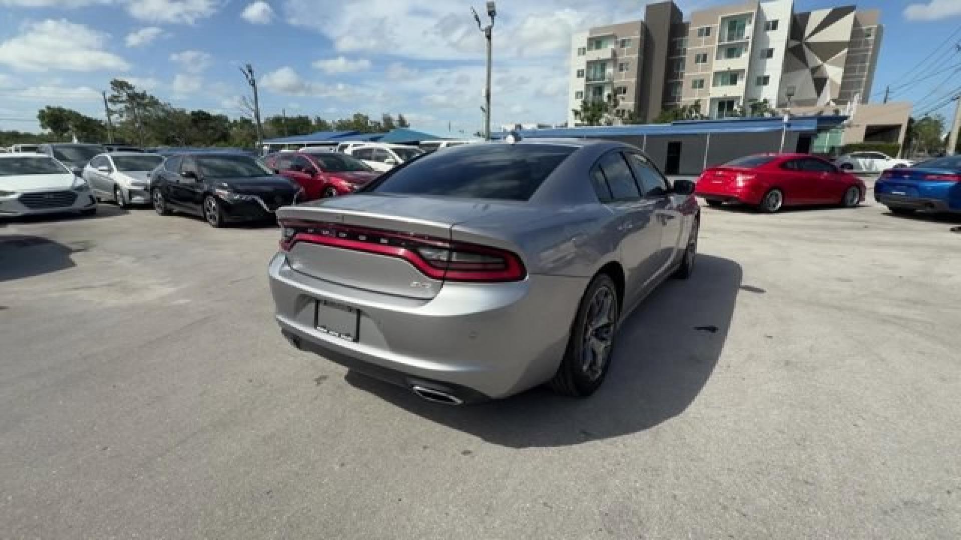 2018 Billet Clearcoat /Black Dodge Charger (2C3CDXHG9JH) with an 6 3.6 L engine, Automatic transmission, located at 27610 S Dixie Hwy, Homestead, FL, 33032, (305) 749-2348, 25.510241, -80.438301 - Boasts 30 Highway MPG and 19 City MPG! This Dodge Charger delivers a Regular Unleaded V-6 3.6 L/220 engine powering this Automatic transmission. WHEELS: 18 X 7.5 CAST ALUMINUM (STD), TRANSMISSION: 8-SPEED AUTOMATIC (845RE) (STD), TIRES: P235/55R18 AS PERFORMANCE (STD).* This Dodge Charger Features t - Photo#4