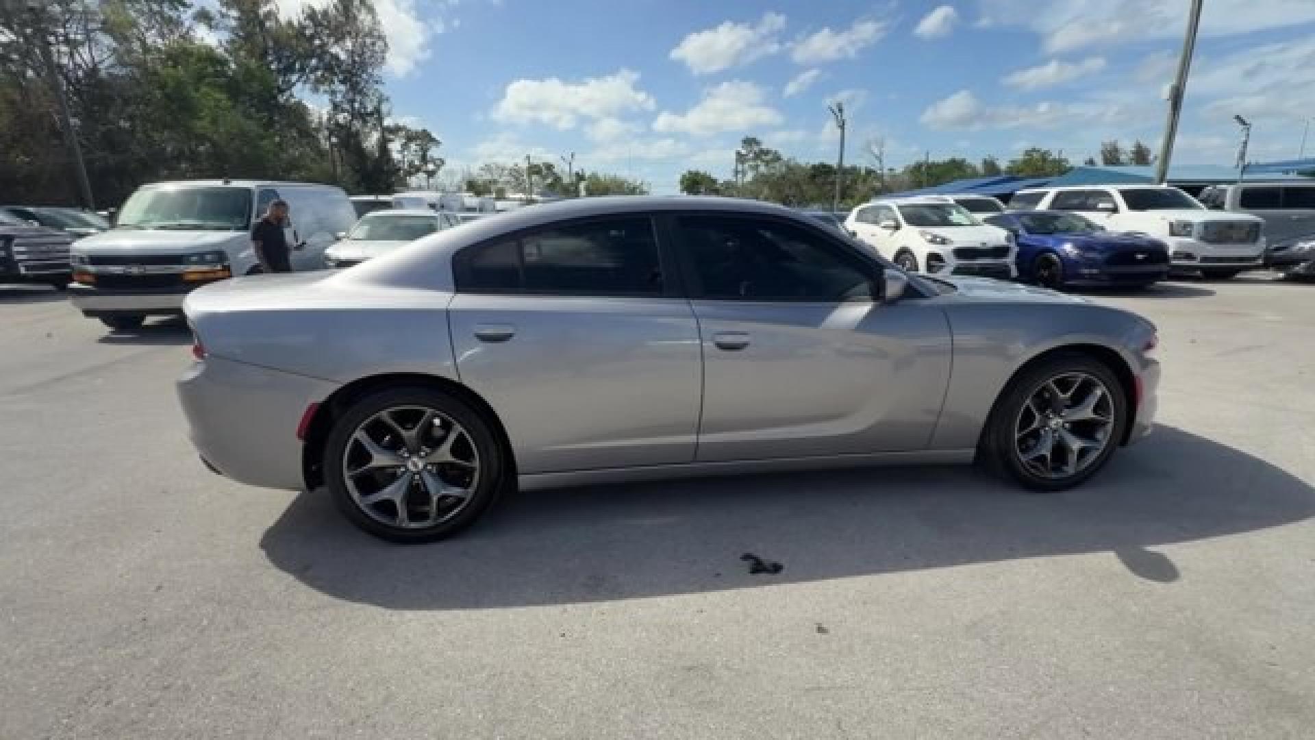 2018 Billet Clearcoat /Black Dodge Charger (2C3CDXHG9JH) with an 6 3.6 L engine, Automatic transmission, located at 27610 S Dixie Hwy, Homestead, FL, 33032, (305) 749-2348, 25.510241, -80.438301 - Boasts 30 Highway MPG and 19 City MPG! This Dodge Charger delivers a Regular Unleaded V-6 3.6 L/220 engine powering this Automatic transmission. WHEELS: 18 X 7.5 CAST ALUMINUM (STD), TRANSMISSION: 8-SPEED AUTOMATIC (845RE) (STD), TIRES: P235/55R18 AS PERFORMANCE (STD).* This Dodge Charger Features t - Photo#5