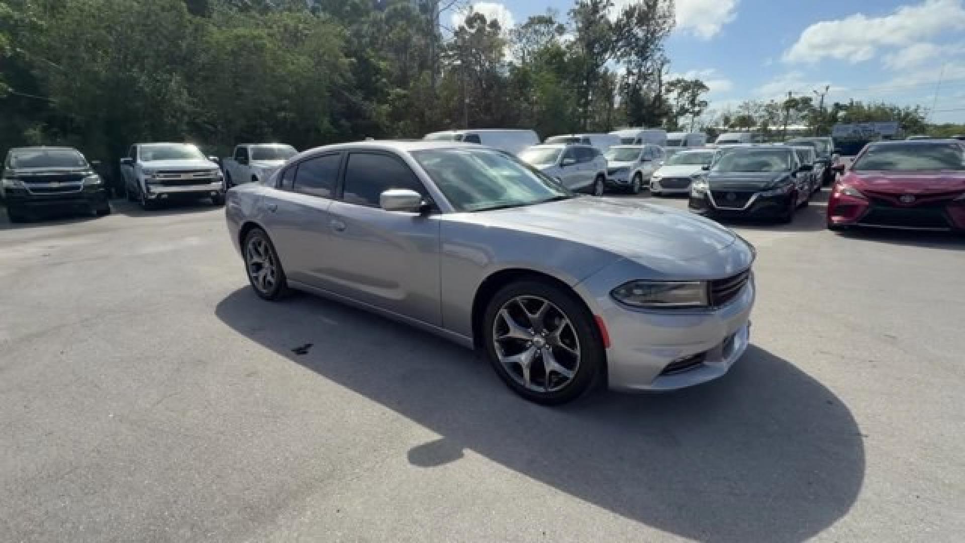 2018 Billet Clearcoat /Black Dodge Charger (2C3CDXHG9JH) with an 6 3.6 L engine, Automatic transmission, located at 27610 S Dixie Hwy, Homestead, FL, 33032, (305) 749-2348, 25.510241, -80.438301 - Boasts 30 Highway MPG and 19 City MPG! This Dodge Charger delivers a Regular Unleaded V-6 3.6 L/220 engine powering this Automatic transmission. WHEELS: 18 X 7.5 CAST ALUMINUM (STD), TRANSMISSION: 8-SPEED AUTOMATIC (845RE) (STD), TIRES: P235/55R18 AS PERFORMANCE (STD).* This Dodge Charger Features t - Photo#6