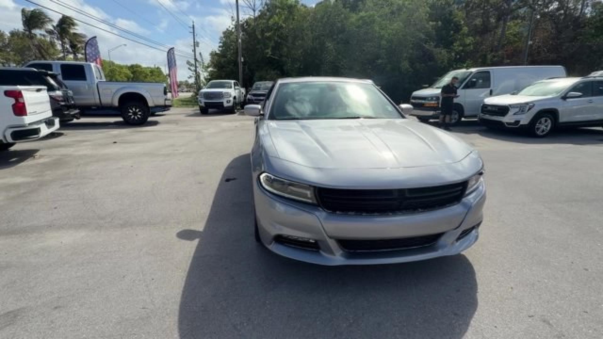 2018 Billet Clearcoat /Black Dodge Charger (2C3CDXHG9JH) with an 6 3.6 L engine, Automatic transmission, located at 27610 S Dixie Hwy, Homestead, FL, 33032, (305) 749-2348, 25.510241, -80.438301 - Boasts 30 Highway MPG and 19 City MPG! This Dodge Charger delivers a Regular Unleaded V-6 3.6 L/220 engine powering this Automatic transmission. WHEELS: 18 X 7.5 CAST ALUMINUM (STD), TRANSMISSION: 8-SPEED AUTOMATIC (845RE) (STD), TIRES: P235/55R18 AS PERFORMANCE (STD).* This Dodge Charger Features t - Photo#7