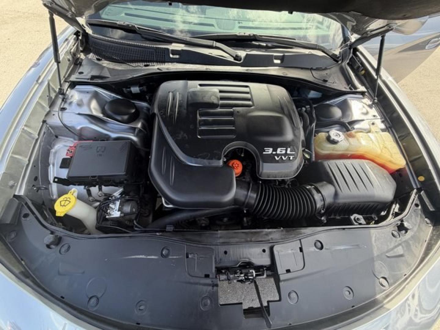 2018 Billet Clearcoat /Black Dodge Charger (2C3CDXHG9JH) with an 6 3.6 L engine, Automatic transmission, located at 27610 S Dixie Hwy, Homestead, FL, 33032, (305) 749-2348, 25.510241, -80.438301 - Boasts 30 Highway MPG and 19 City MPG! This Dodge Charger delivers a Regular Unleaded V-6 3.6 L/220 engine powering this Automatic transmission. WHEELS: 18 X 7.5 CAST ALUMINUM (STD), TRANSMISSION: 8-SPEED AUTOMATIC (845RE) (STD), TIRES: P235/55R18 AS PERFORMANCE (STD).* This Dodge Charger Features t - Photo#14