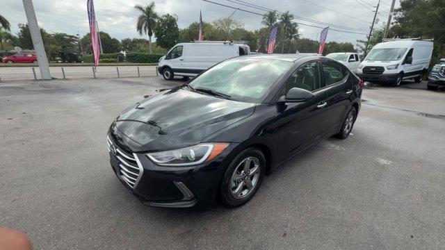 2017 Phantom Black /Beige Hyundai Elantra (5NPD94LA5HH) with an 4 1.4 L engine, Automatic transmission, located at 27610 S Dixie Hwy, Homestead, FL, 33032, (305) 749-2348, 25.510241, -80.438301 - IIHS Top Safety Pick+, Top Safety Pick+. Boasts 40 Highway MPG and 32 City MPG! This Hyundai Elantra delivers a Intercooled Turbo Regular Unleaded I-4 1.4 L/83 engine powering this Automatic transmission. REVERSIBLE CARGO TRAY, REAR BUMPER APPLIQUE, PHANTOM BLACK.*This Hyundai Elantra Comes Equipped - Photo#0